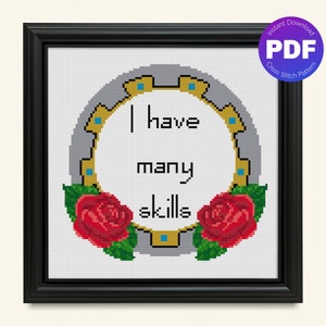 May include: Cross stitch pattern featuring a circular frame with the text "I have many skills" surrounded by red roses and green leaves.