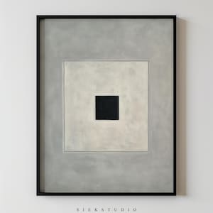 May include: Framed abstract artwork featuring a black square within a white square, centered on a gray background. The artwork is encased in a black frame and the text "SIEKSTUDIO" is at the bottom.