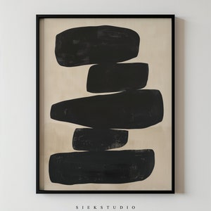 May include: Abstract art print with a beige background and black geometric shapes. The print is framed in black and has the text "SIEKSTUDIO" at the bottom.