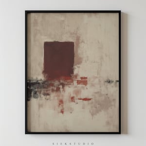 Könnte beinhalten: Abstrakter Kunstdruck in einem schwarzen Rahmen. Das Kunstwerk zeigt ein großes, dunkelrotes Quadrat in der Mitte, mit kleineren roten und braunen Formen am unteren Rand. Der Hintergrund ist ein helles Beige mit sichtbaren Pinselstrichen. Der Text "SIEK STUDIO" befindet sich unten.