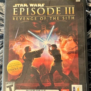 May include: Xbox video game case for Star Wars Episode III: Revenge of the Sith. The case features a black background with a green Xbox logo and a red and blue lightsaber duel between two characters. The game includes actual film footage from the movie.
