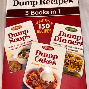 May include: A collection of cookbooks titled "Dump Recipes" featuring three books in one. The covers are red and white, with titles like "Dump Soups," "Dump Dinners," and "Dump Cakes." The books promise over 150 recipes.