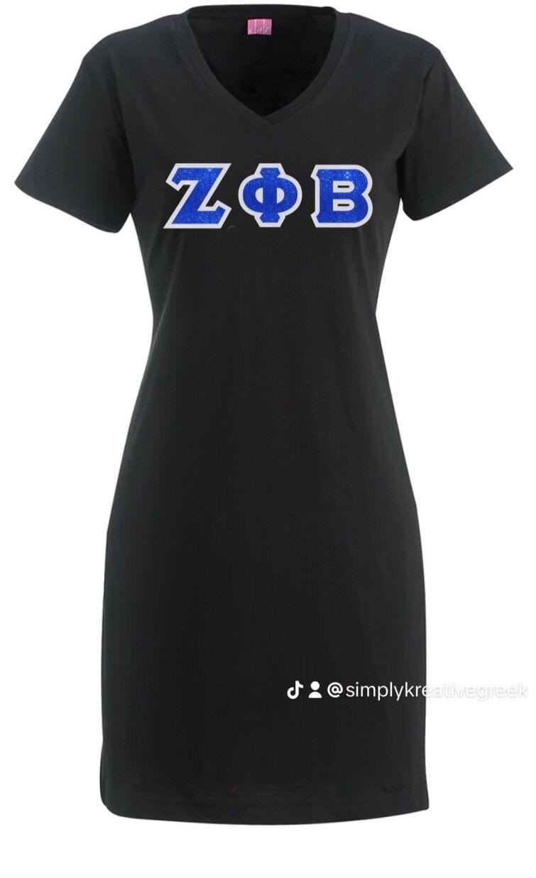 Zeta Phi Beta Glitter/Non-Glitter V-Neck T-Shirt Dress (Optional-Personalization) Zeta Phi Beta Glitter/Non-Glitter V-Neck T-Shirt Dress (Optional-Personalization)