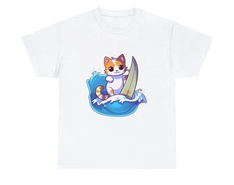 May include: White t-shirt with a cartoon image of a cat surfing on a blue wave. The cat is orange, white, and black with blue eyes.