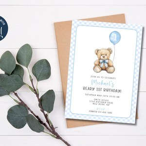 May include: Blue and white checkered invitation with a teddy bear holding a blue balloon with the number 1 on it. The text reads "Join us to celebrate Michael's Beary 1st Birthday! Saturday May 24th 10:00 AM Smith House 1234 Birthday Drive New York, NY RSVP Jennifer 123-456-7890"