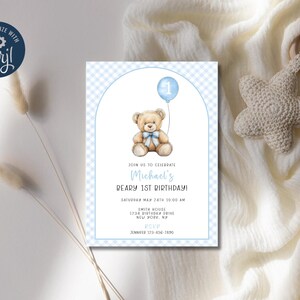 May include: Blue and white checkered invitation with a teddy bear holding a blue balloon. The invitation says "Join us to celebrate Michael's Beary 1st Birthday!" with the date and time of the party.