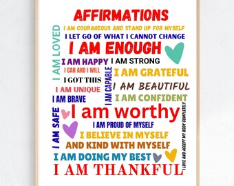May include: A framed print with the word "AFFIRMATIONS" in red at the top. The print contains positive affirmations in various colors and fonts, including "I AM ENOUGH" and "I AM WORTHY."