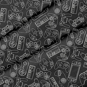 May include: A black fabric background with a white outline pattern of various video game controllers. The pattern includes a variety of controllers, such as classic NES, SNES, Playstation, Xbox, and Nintendo Switch controllers.