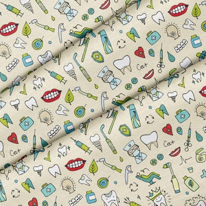 May include: A beige fabric with a repeating pattern of dental care items drawn in black, red, blue, and green. The pattern includes teeth, toothbrushes, toothpaste, floss, dental tools, and a dentist.