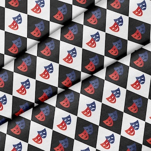 May include: A black and white checkered fabric with a repeating pattern of red and blue theatrical masks. The masks are stylized and have a happy and sad expression.