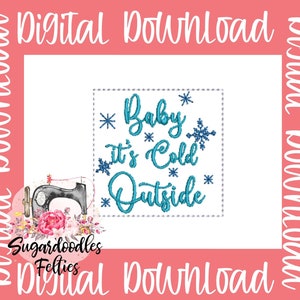 May include: Embroidered design with blue text that reads "Baby It's Cold Outside" with snowflakes and stars. The design is on a white background with a gray dashed border.