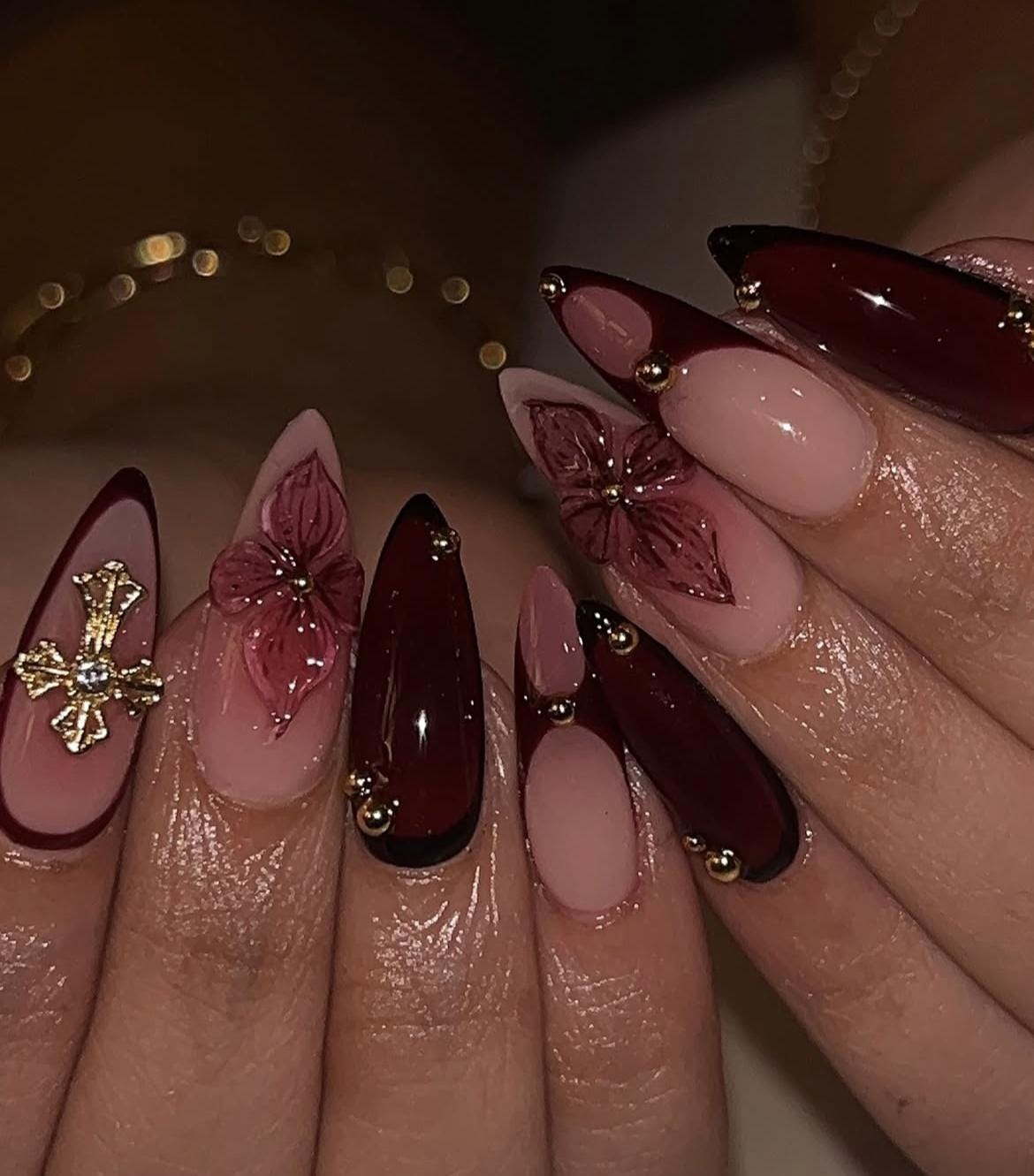 Stunning Maroon Nails with Gold Veins