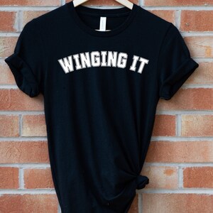 Winging It Slogan Tshirt | Funny Sarcastic Adulting Tee | Black, White, Baby Blue | College Style Letters