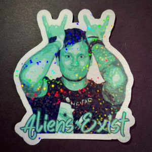 Tom Delonge, aliens exist, holographic sticker