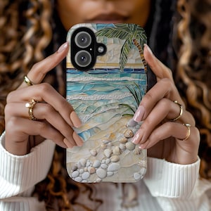 May include: A phone case featuring a mosaic design of a beach scene with a palm tree, ocean waves, and seashells. The case has a glossy finish and a dual-camera cutout.