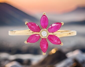 14K Gold Marquise Cut Ruby and Bezel Set Diamond Ring - 3/5 CTW