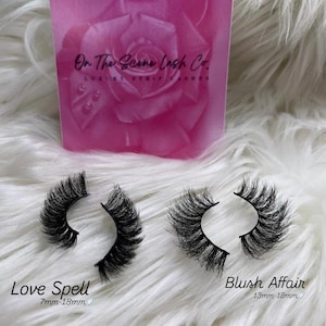 May include: Two pairs of false eyelashes, one labeled "Love Spell 7mm-18mm" and the other labeled "Blush Affair 13mm-18mm".