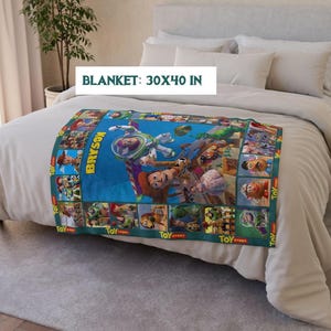 May include: A rectangular blanket featuring characters from the Toy Story movie. The blanket is 30 x 40 inches and has a blue background with images of Woody, Buzz Lightyear, and other characters. The name "Bryson" is printed on the blanket.