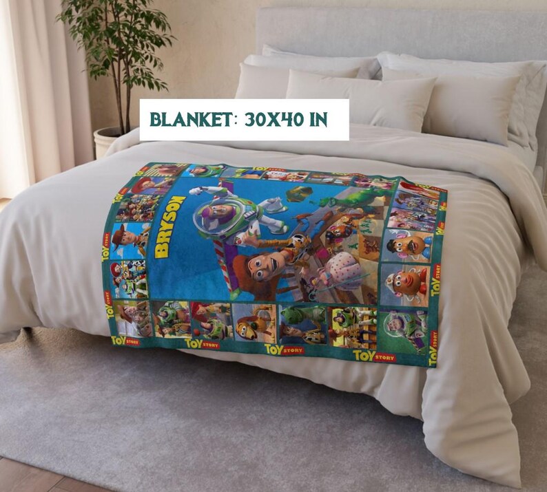 May include: A rectangular blanket featuring characters from the Toy Story movie. The blanket is 30 x 40 inches and has a blue background with images of Woody, Buzz Lightyear, and other characters. The name "Bryson" is printed on the blanket.