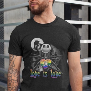 May include: Black t-shirt with a graphic of Jack Skellington from The Nightmare Before Christmas holding a rainbow heart. The text "Love is Love" is printed below the graphic.