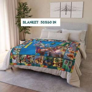 May include: A blue blanket featuring characters from the animated film "Toy Story." The blanket measures 50 x 60 inches and has a green border with the words "Toy Story" printed on it. The blanket is spread across a bed with white bedding.