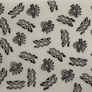 May include: A white background with a repeating pattern of black stylized faces and wavy lines.