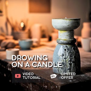 May include: A ceramic candle holder with a white and blue speckled finish. The candle holder has a wide top and a detailed floral design. The text "DROWING ON A CANDLE" is displayed, along with "VIDEO TUTORIAL" and "LIMITED OFFER".