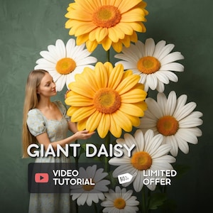 Pode incluir: Uma mulher posa perto de grandes margaridas de papel. As flores são brancas e amarelas com centros laranja. O texto "GIANT DAISY" é exibido, juntamente com "VIDEO TUTORIAL" e "LIMITED OFFER". O fundo é verde escuro.