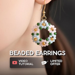 May include: A close-up of a beaded earring with a floral design. The earring features a gold-colored hook and a circular arrangement of white, light blue, green, and gold beads. The text "BEADED EARRINGS" is displayed.