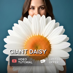May include: A large, decorative daisy flower with numerous white petals and a textured, golden-yellow center. The image includes the text GIANT DAISY, VIDEO TUTORIAL, 50% OFF, and LIMITED OFFER, presented in a clear, professional layout.