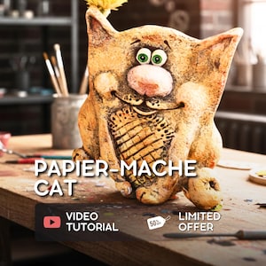 May include: A papier-mâché cat sculpture with a whimsical design. The cat is primarily orange with green eyes, a pink nose, and a detailed chest pattern. A yellow flower adorns its head. The image includes text that reads "PAPIER-MACHE CAT" and "VIDEO TUTORIAL".