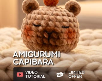 May include: A handmade amigurumi capybara plushie, featuring a round body, small ears, and a pumpkin-like detail on its head. The plushie is light brown with rosy cheeks and closed eyes. The image includes the text "AMIGURUMI CAPIBARA" and "VIDEO TUTORIAL".