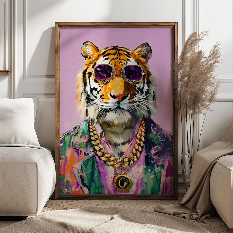 May include: A framed art print depicting a tiger wearing purple sunglasses, a gold chain necklace with a pendant, and a colourful jacket. The tiger is set against a pink background.