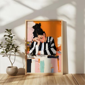 May include: A painting of a person with black hair wearing a black and white striped shirt, resting their head on their hand. The person is sitting at a table with a colorful abstract background.