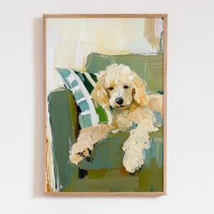 May include: An oil painting in a light wood frame depicting a cream-coloured dog with curly fur resting on a dark green armchair. A striped green and white pillow is positioned behind the dog. The artwork features visible, thick brushstrokes.
