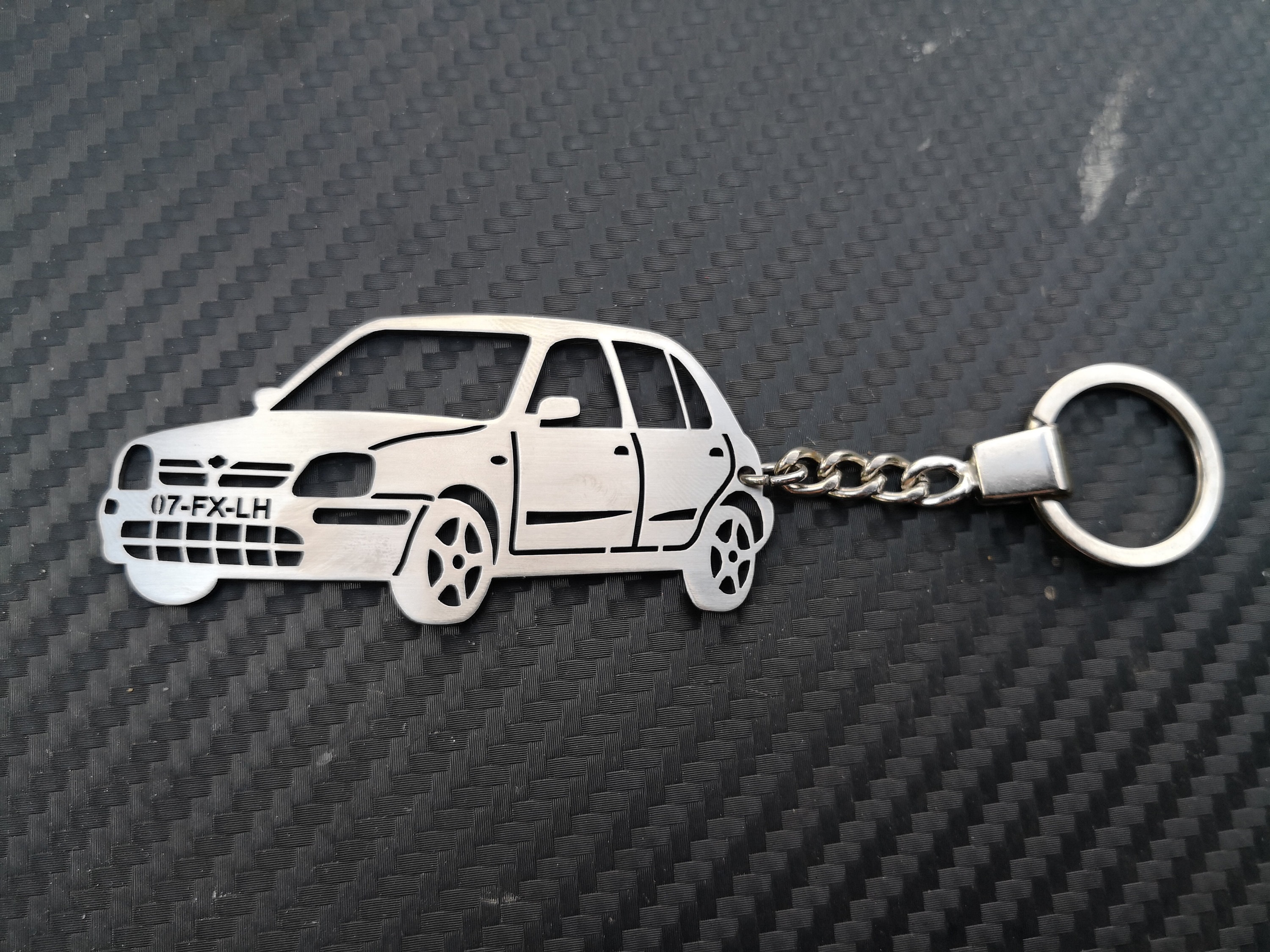 Nissan micra best sale keyring