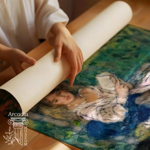 May include: A rolled-up art print featuring an impressionist-style painting of a person reading, with visible brushstrokes in shades of deep blue, green, and soft skin tones. The print includes the text Arcadia Museum with a column icon.