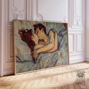 May include: A rectangular framed art print featuring a painting of two figures embracing and kissing while lying in bed. The artwork uses a palette of soft blues, creams, and warm skin tones with visible brushstrokes. The text Arcadia Museum is visible.