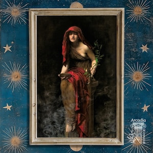 May include: A framed print of a classical painting. The artwork depicts a woman in a red head covering and draped clothing, holding a bowl and a sprig of leaves. The background is dark, with a smoky effect. The frame is light-colored, set against a blue background with star and sunburst designs.