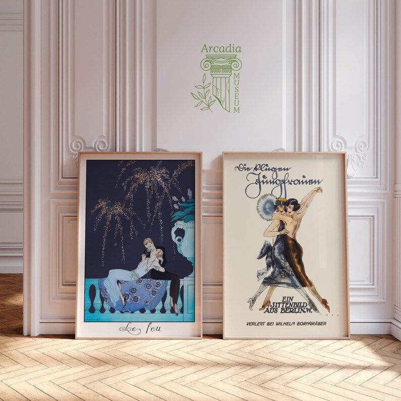 May include: Two framed art prints featuring vintage illustrations. The left print, titled Le feu, shows two figures on a balcony against a dark blue sky with fireworks. The right print, titled Die klugen Jungfrauen, depicts two figures dancing.
