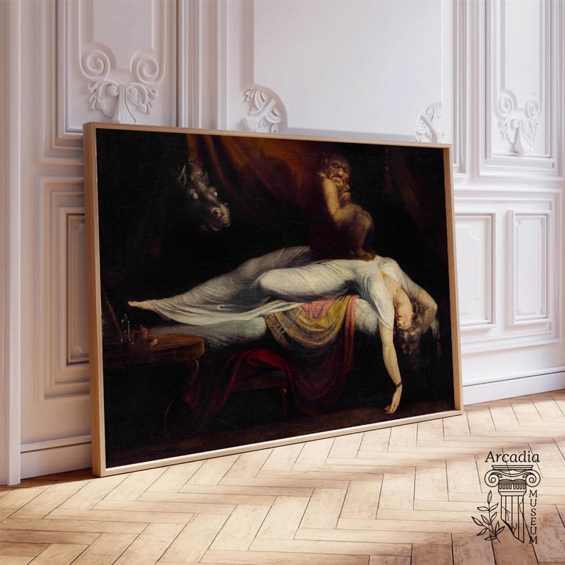 May include: A framed oil painting depicting a reclining figure in a white gown on a dark bed, with a shadowy creature perched on their chest. The scene features deep red and brown tones, dramatic lighting, and a dark horse head in the background.