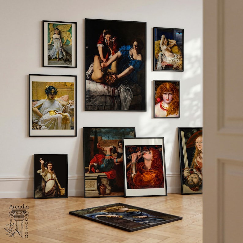 May include: A collection of nine framed art prints featuring classical oil paintings with various figures, including scenes of historical and mythological subjects, displayed on a wall and floor with black frames and a logo reading Arcadia Museum.