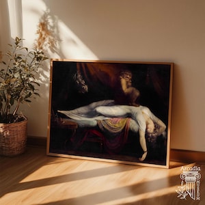 May include: A framed art print featuring a reproduction of Henry Fuseli's The Nightmare, depicting a reclining figure in a white gown on a bed with a dark, shadowy creature perched on their chest, set against a deep, moody, and dark background.