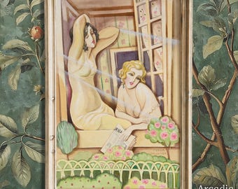 May include: A framed art print featuring two figures in a window setting, one with dark hair and one with blonde hair, both wearing light-colored garments. The scene includes a garden with a white fence, pink flowers, and the signature Gerda Wegener.
