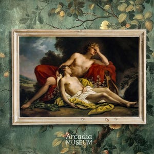 May include: A framed oil painting depicting two figures resting in a landscape. One figure reclines with a hand over their eyes, draped in red fabric, while the other lies below in white and yellow cloth. A lyre is visible. Text reads Arcadia MUSEUM.