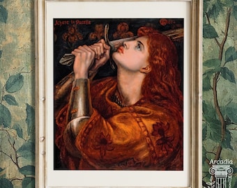 May include: A framed art print featuring a painting of a person with long red hair wearing orange clothing and metal armor, holding a sword near their face. The text Jehane la Pucelle and 1882 are visible in the upper corners of the artwork.