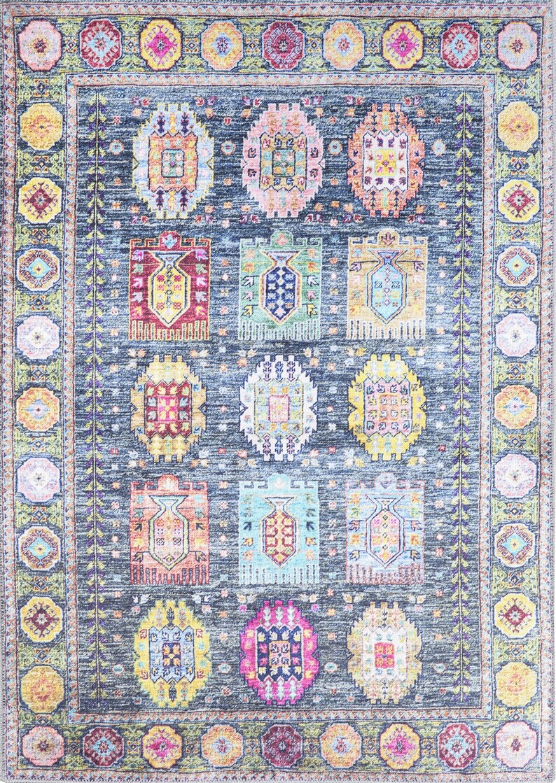May include: A colorful rug with a geometric pattern in shades of blue, green, yellow, pink, and red. The rug has a border with a floral design.