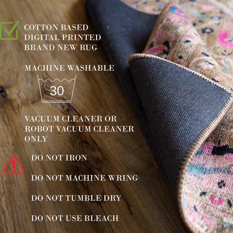 May include: A close-up of a rug's care instructions. The instructions are printed on a wooden surface and include the following: Cotton Based, Digital Printed, Brand New Rug, Machine Washable, 30 degrees, Vacuum Cleaner or Robot Vacuum Cleaner Only, Do Not Iron, Do Not Machine Wring, Do Not Tumble Dry, Do Not Use Bleach.