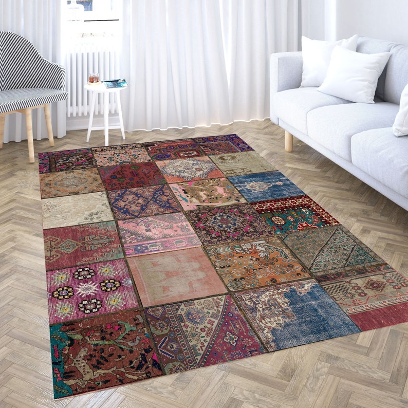 May include: A colorful patchwork rug with a variety of patterns and colors, including red, blue, green, and brown. The rug is made up of many different squares, each with its own unique design.