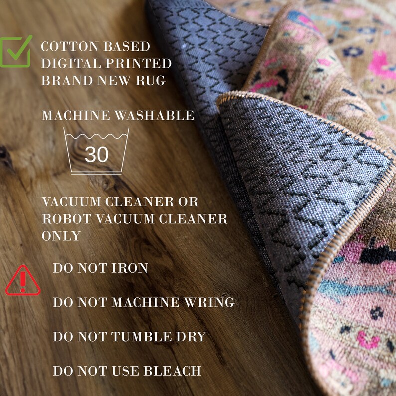 May include: A close-up of a rug's care instructions. The instructions state that the rug is cotton based, digitally printed, and machine washable. The rug should be cleaned with a vacuum cleaner or robot vacuum cleaner. The instructions also state that the rug should not be ironed, machine wrung, tumble dried, or bleached.